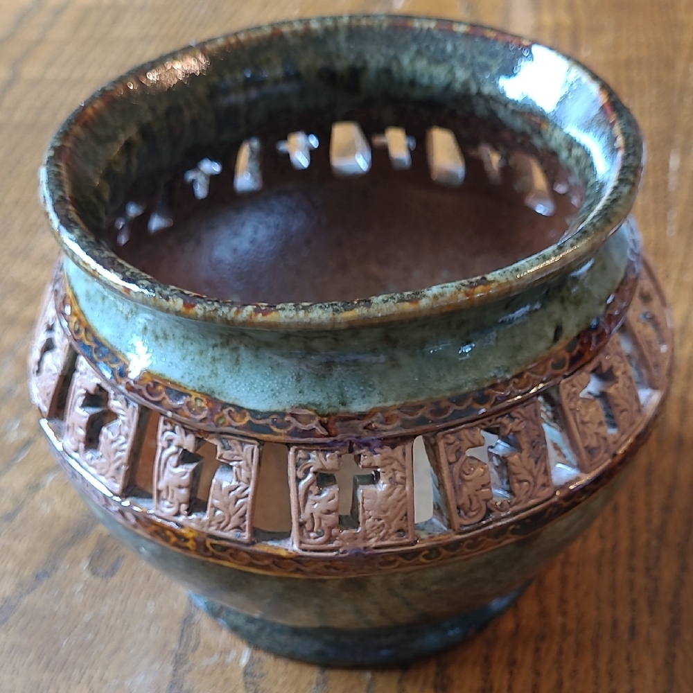 Handcrafted Ceramic Vase with Intricate Design
